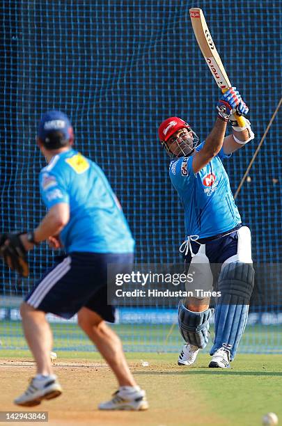 Delhi Daredevils captain Virender Sehwag does batting drills in nets during the practice section at Wankhede Stadium on April 15, 2012 in Mumbai,...