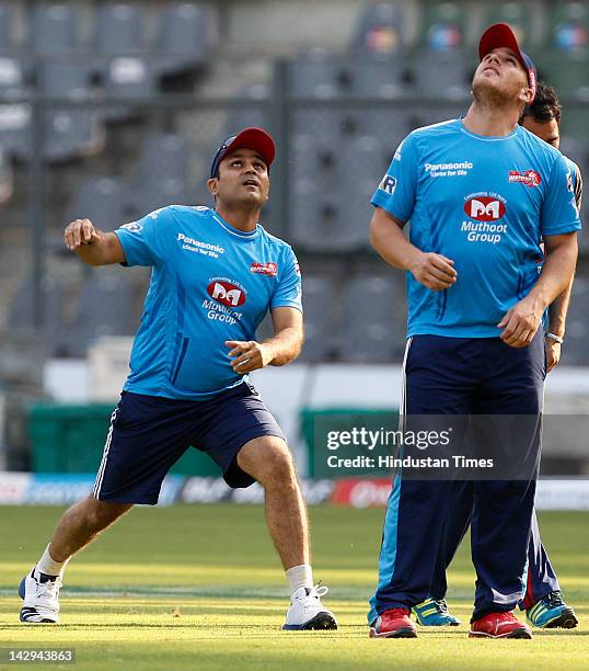 Delhi Daredevils captain Virender Sehwag does catching drills during the practice section at Wankhede Stadium on April 15, 2012 in Mumbai, India. The...