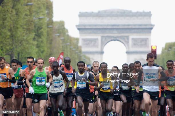 Competitors run during the 36th Paris Marathon on April 15, 2012 in Paris, France.