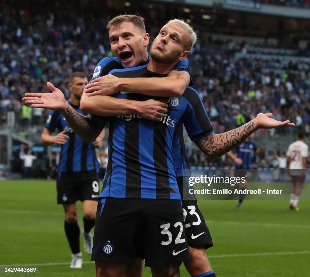 Federico Dimarco of FC Internazionale celebrates with his team-mate Nicolo Barella after scoring the opening goal during the Serie A match between FC...