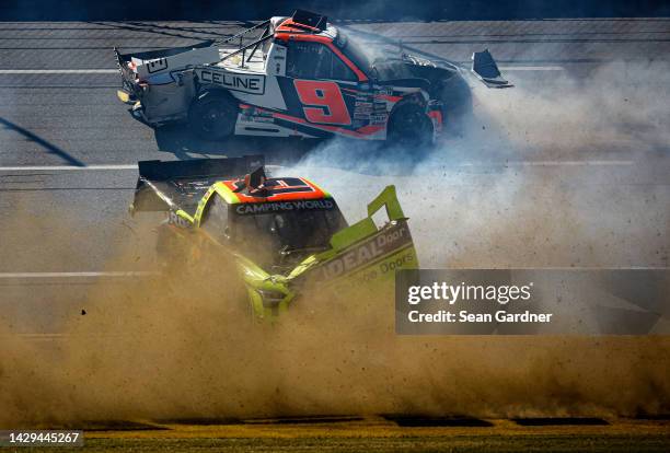 Blaine Perkins, driver of the RACELINE Chevrolet, and Johnny Sauter, driver of the Ideal Door/Menards Toyota, spin after an on-track incident during...