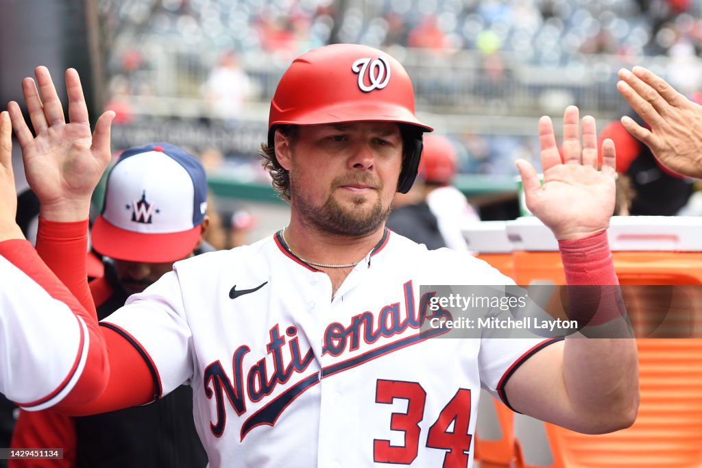 On Voit Luke Voit of the Washington Nationals celebrates scoring on Ildemaro ...