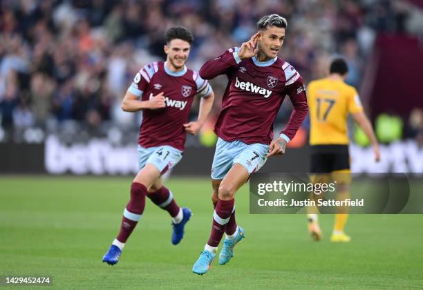 Gianluca Scamacca of West Ham United celebrates after scoring their sides first goal during the Premier League match between West Ham United and...