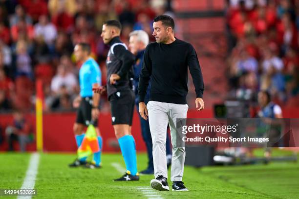 Xavi Hernandez, head coach of Barcelona looks on during the LaLiga Santander match between RCD Mallorca and FC Barcelona at Estadi de Son Moix on...