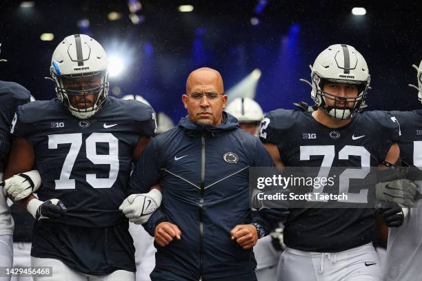 Head coach James Franklin of the Penn State Nittany Lions leads the team onto the field before the game against the Northwestern Wildcats at Beaver...