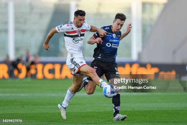 Richard Schunke of Independiente del Valle fights for the ball with Jonathan Calleri of Sao Paulo during the Copa CONMEBOL Sudamericana 2022 Final...