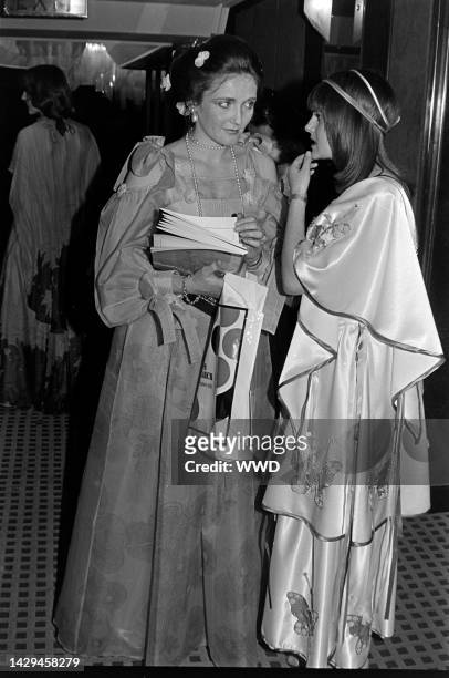 Lady Leonora Lichfield and Lady Jane Wellesley attend a gala at the Intercontinental Hotel in London, England, on March 4, 1976.