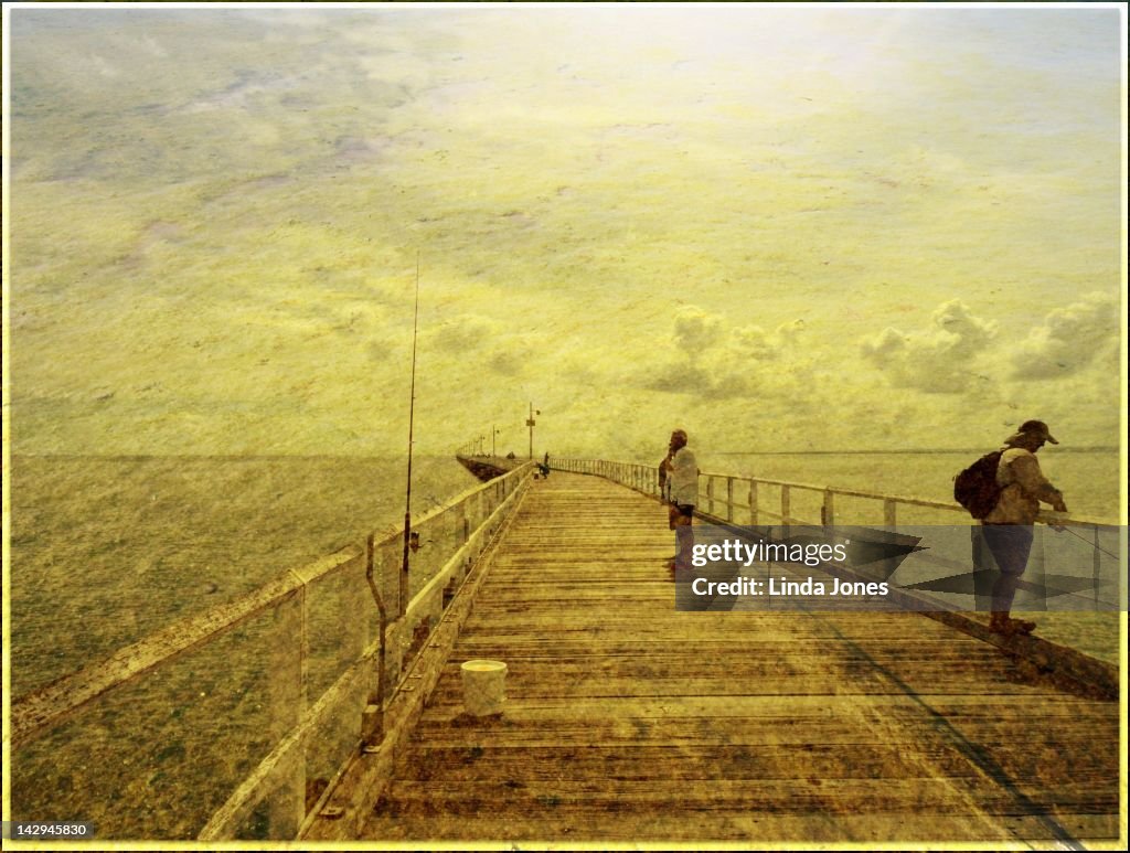 Fisherman on pier