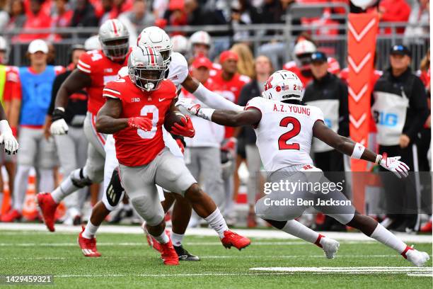 Miyan Williams of the Ohio State Buckeyes runs with the ball during the first quarter of a game against the Rutgers Scarlet Knights at Ohio Stadium...