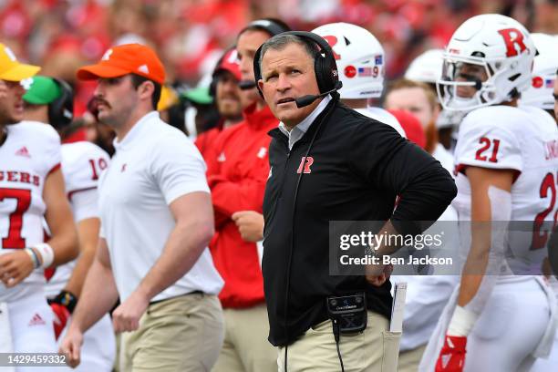 Head Coach Greg Schiano of the Rutgers Scarlet Knights watches a replay during the second quarter of a game against the Ohio State Buckeyes at Ohio...