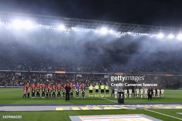 Players line up for the Australian national anthem during the Australia Cup Final match between Sydney United 58 FC and Macarthur FC at Allianz...