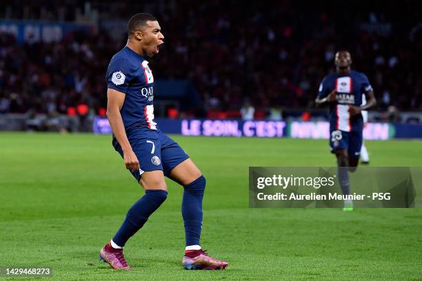 Kylian Mbappe of Paris Saint-Germain reacts after scoring during the Ligue 1 match between Paris Saint-Germain and OGC Nice at Parc des Princes on...