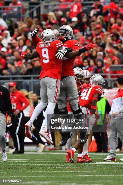 Zach Harrison and Dawand Jones of the Ohio State Buckeyes celebrate following a fumble recovery during the third quarter of a game against the...