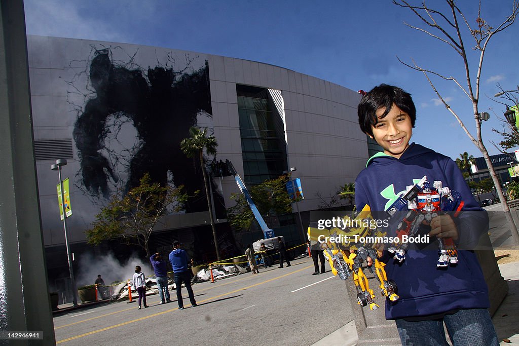A Decepticon Transformer Smashes Through Staples Center To Promote Universal Studios Hollywood's "Transformers: The Ride 3-D"
