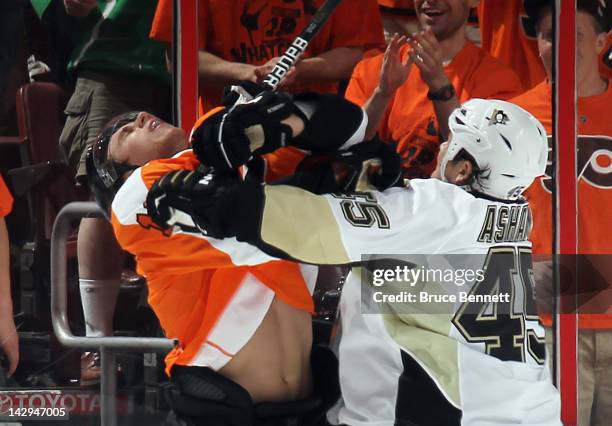 Arron Asham of the Pittsburgh Penguins gets a match penalty for high sticking Brayden Schenn of the Philadelphia Flyers in Game Three of the Eastern...