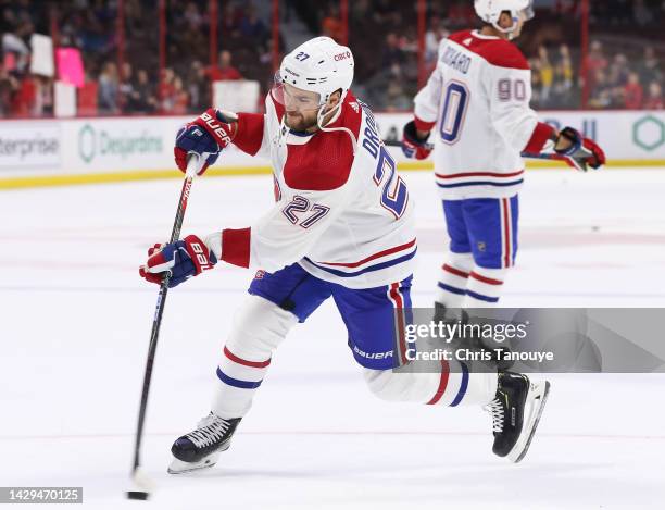 Jonathan Drouin of the Montreal Canadiens shoots the puck during warm-up prior to the game against the Ottawa Senators at Canadian Tire Centre on...