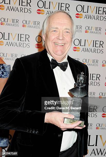 Special Award winner Sir Tim Rice poses in the press room at the 2012 Olivier Awards held at The Royal Opera House on April 15, 2012 in London,...
