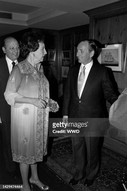 William H. Putch, Jean Stapleton, and John Coleman attend a party at the Ritz-Carlton Hotel in Washington, D.C., on December 5, 1982.