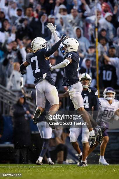 Jaylen Reed of the Penn State Nittany Lions celebrates with Zakee Wheatley after a defensive play against the Northwestern Wildcats during the second...