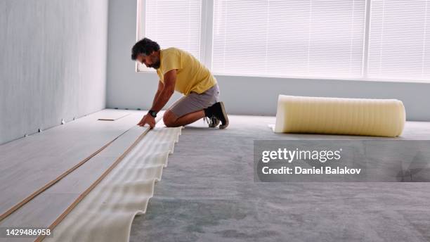 diy laminate flooring install on a budget an home. - parket stockfoto's en -beelden
