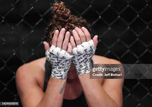 Mackenzie Dern reacts after her decision loss to Yan Xiaonan of China in a strawweight fight during the UFC Fight Night event at UFC APEX on October...