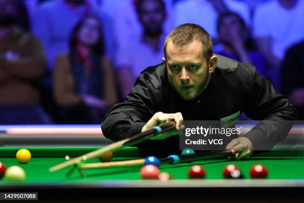 Mark Allen of Northern Ireland plays a shot in the semi-final match against Noppon Saengkham of Thailand on day six of the 2022 Cazoo British Open at...