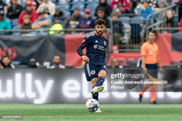 Carles Gil of New England Revolution passes the ball during a game between Atlanta United FC and New England Revolution at Gillette Stadium on...