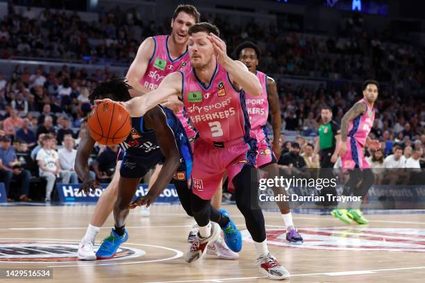 Cameron Gliddon of the Breakers gathers the ball during the round one NBL match between Melbourne United and New Zealand Breakers at John Cain Arena,...