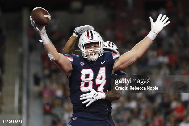 Tight end Tanner McLachlan of the Arizona Wildcats celebrates his touchdown during the first half of the NCAA football game against the Colorado...