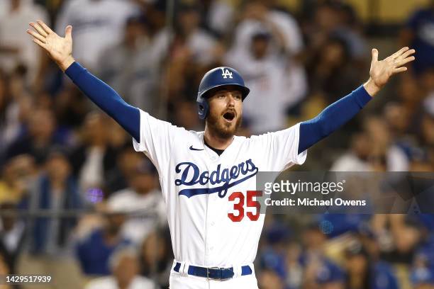Cody Bellinger of the Los Angeles Dodgers reacts after Mookie Betts hit was ruled a foul ball against the Colorado Rockies during the sixth inning at...