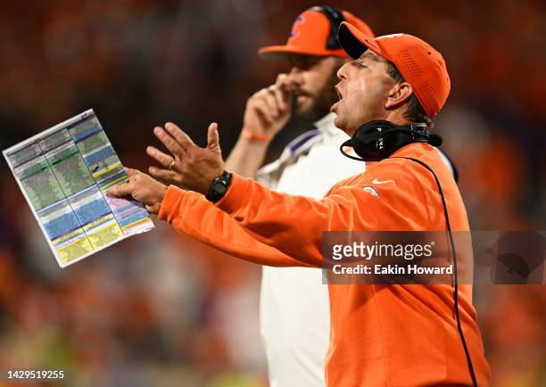 Head coach Dabo Swinney of the Clemson Tigers reacts on the sideline after a timeout is called in the fourth quarter against the North Carolina State...