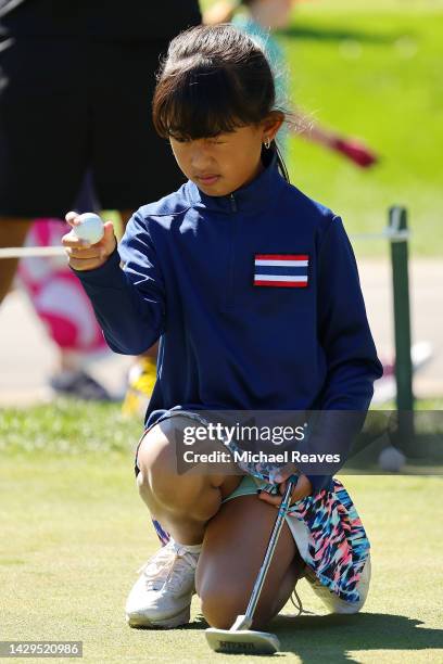 Aya Chantharojwongse lines up a putt during the putting skill of the Girls 7-9 division during the The Drive, Chip and Putt Championship Regional...