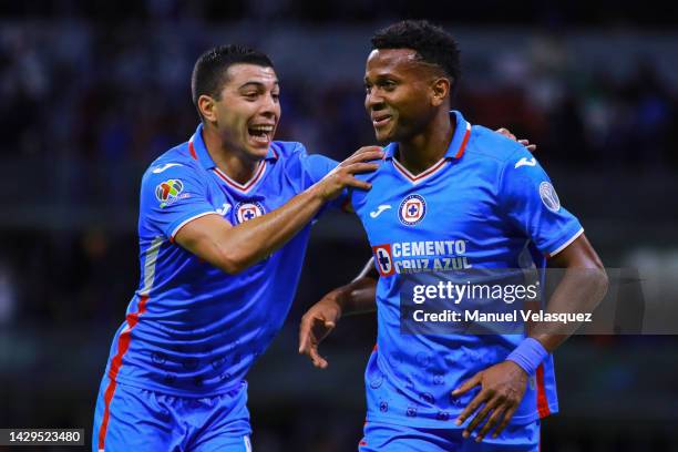 Michael Estrada of Cruz Azul celebrates with Erik Lira of Cruz Azul after scoring his team's second goal during the 17th round match between Cruz...