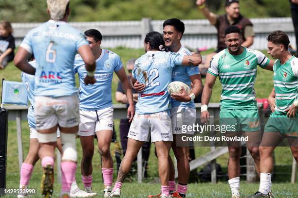 Tamati Tua of Northland is congratulated on scoring a try during the round nine Bunnings NPC match between Northland and Manawatu at Kaikohe RFC, on...
