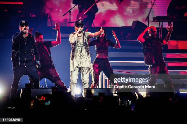 Wisin & Yandel perform during their "La Ultima Misión" Tour at at Amway Center on October 01, 2022 in Orlando, Florida.