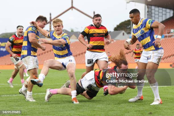 Patrick McCurran of Waikato dives in for the winning try during the round nine Bunnings NPC match between Waikato and Bay of Plenty at FMG Stadium,...