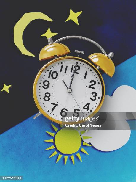 day and night conceptual.circadian rythm with alarm clock - day night stock pictures, royalty-free photos & images