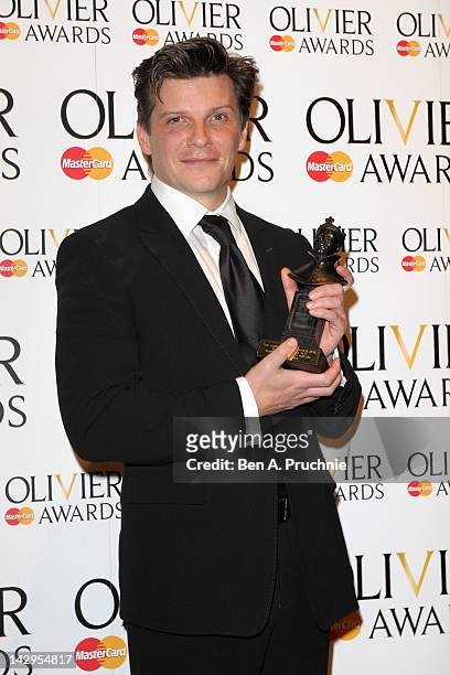 Best Supporting Actor winner Nigel Harman poses in the press room during the 2012 Olivier Awards at The Royal Opera House on April 15, 2012 in...