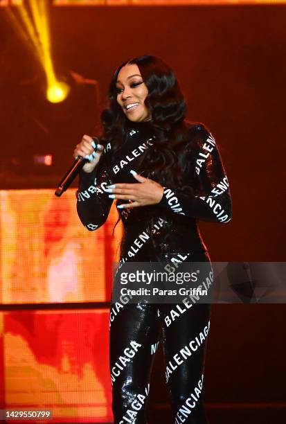 Singer Monica performs onstage during Atlanta R&B Music Experience concert at State Farm Arena on October 01, 2022 in Atlanta, Georgia.