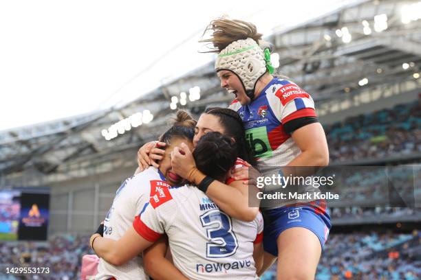 Kiana Takairangi of the Knights celebrates with team mates after scoring a try during the NRLW Grand Final match between Newcastle Knights and...