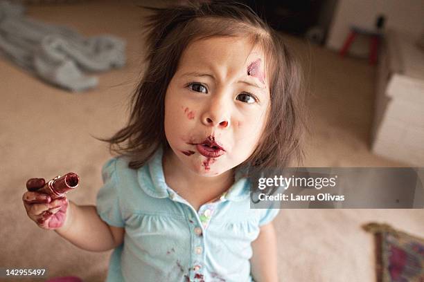 toddler eating lipstick - lipstick stock pictures, royalty-free photos & images