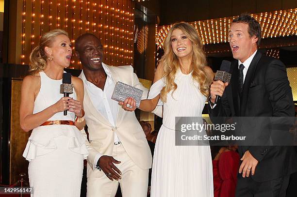 Singer Seal and Delta Goodrem are interviewed by Sonia Kruger and Jules Lund as they arrive at the 2012 Logie Awards at the Crown Palladium on April...