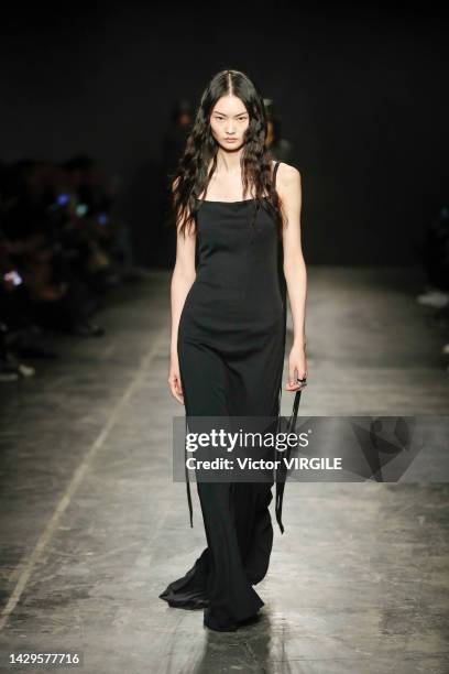 Model walks the runway during the Ann Demeulemeester Ready to Wear Spring Summer 2023 fashion show as part of the Paris Fashion Week on October 01,...