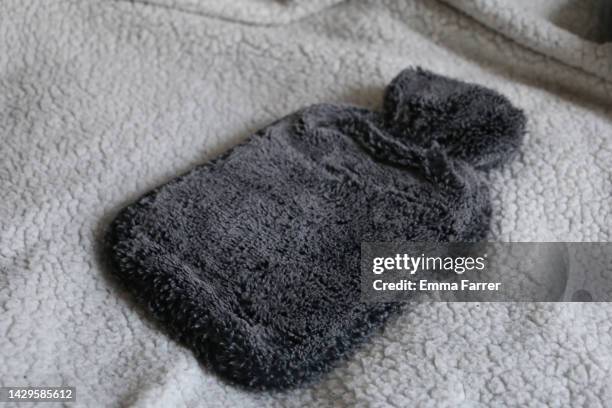 hot water bottle - hot water bottle stock pictures, royalty-free photos & images