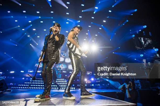 Musicians Klaus Meine and Matthias Jabs of Scorpions perform on stage during their "Rock Believer" tour at Viejas Arena at San Diego State University...