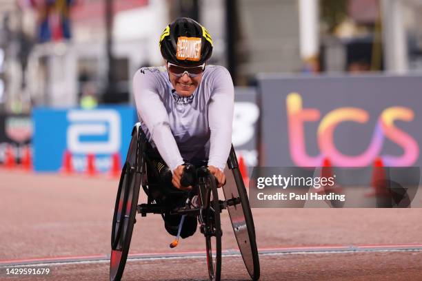 Catherine Debrunner of Switzerland finishes in first place in the Elite Women's Wheelchair Race during the 2022 TCS London Marathon on October 02,...