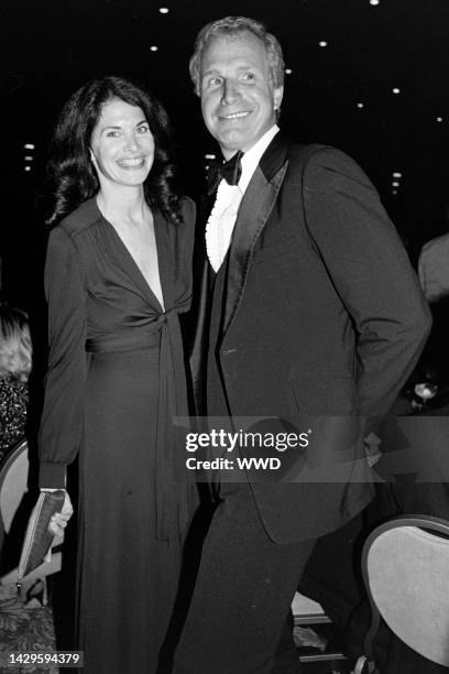 Sherry Lansing and Wayne Rogers attend an event at the Beverly Hilton Hotel in Beverly Hills, California, on April 22, 1983.