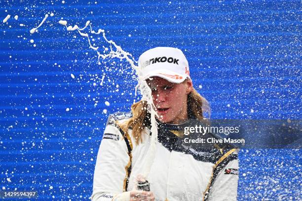 Race winner Beitske Visser of Netherlands and Sirin Racing celebrates on the podium during the W Series Round 6 race at Marina Bay Street Circuit on...