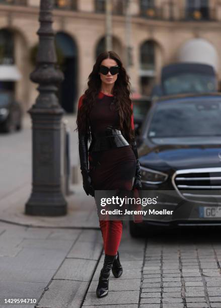 Sabina Jakubowicz seen wearing a Loewe dress with a bag by Coperni, Balenciaga sunglasses and shoes by Yves Saint Laurent, outside Loewe during Paris...