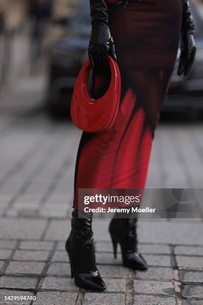 Sabina Jakubowicz seen wearing a Loewe dress with a bag by Coperni, Balenciaga sunglasses and shoes by Yves Saint Laurent, outside Loewe during Paris...